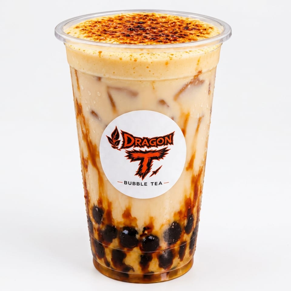 Caramel bubble tea with tapioca pearls, iced milk tea, and a brûléed topping in a Dragon T Bubble Tea cup.