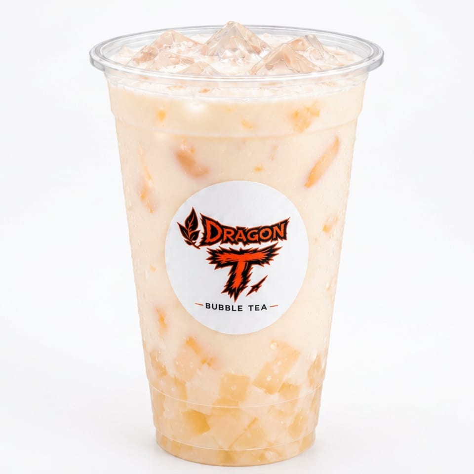 Iced creamy bubble tea with fruit jelly pieces in a clear Dragon T Bubble Tea cup.