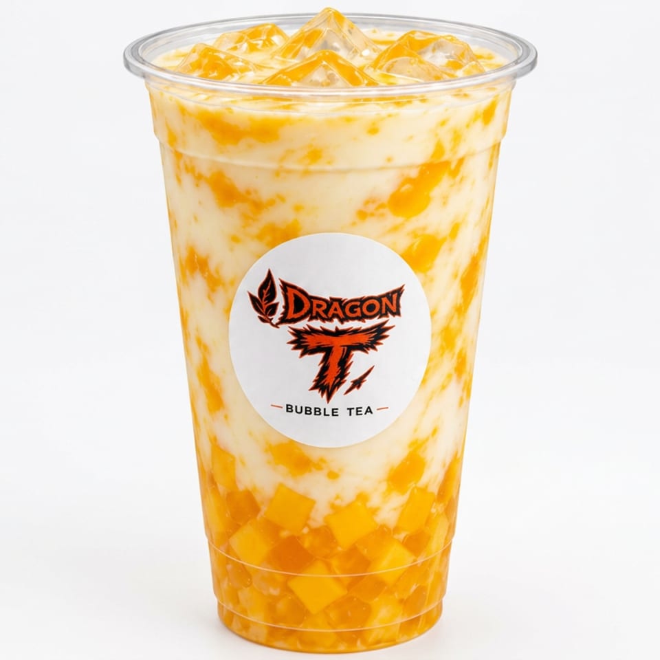 Dragon Bubble Tea cup filled with a creamy orange mango drink, fruit pieces, and ice.